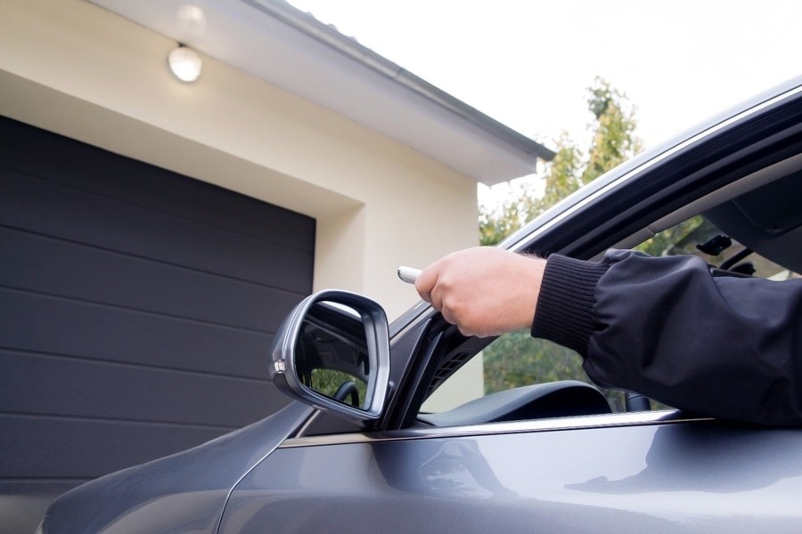 how to stop garage door prying