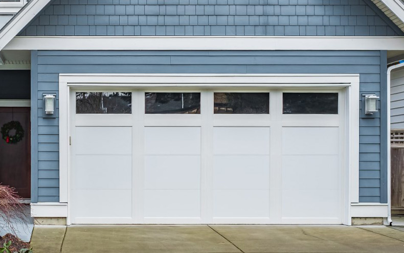 how to stop garage door prying