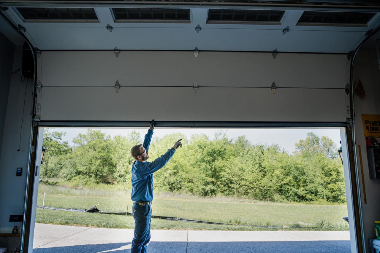 how to inspect garage door pulley system