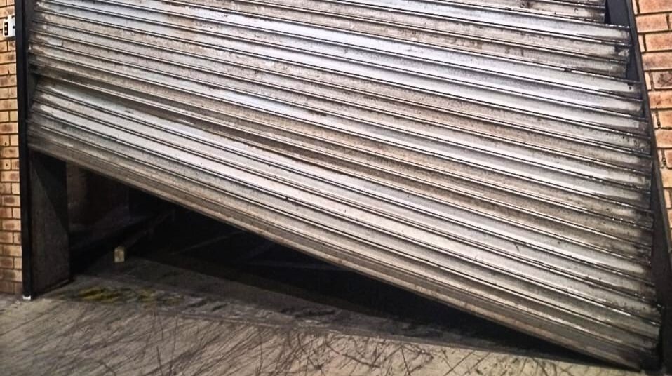 garage door rollers sticking midway Garage Door Rollers Sticking Midway: How to Fix