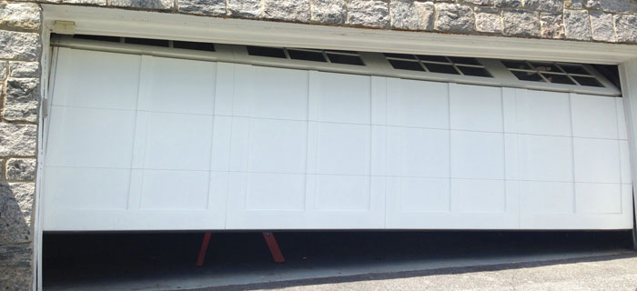 Garage Door Halfway Due to Cable Fray: Safety Guide
