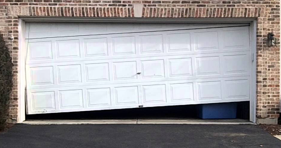 Garage Door Half Opens Then Closes: Causes and Fixes